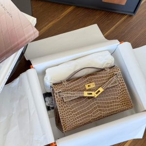 Alternative view of Hermès Kelly Pochette Ficelle Shiny Crocoidle Palladium Hardware