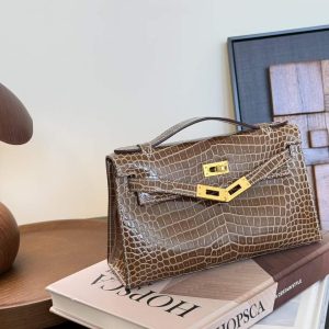 Hermès Kelly Pochette Ficelle Shiny Crocoidle Palladium Hardware